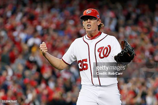 Tyler Clippard of the Washington Nationals reacts after he struck out the side to end the top of the eighth inning against the St. Louis Cardinals...