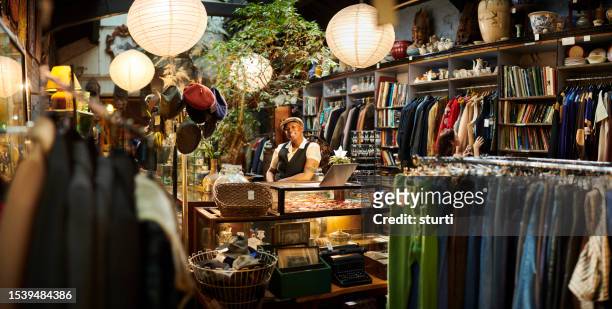 thrift store owner - small business owners stock pictures, royalty-free photos & images