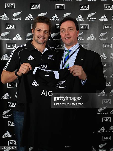 All Black captain Richie McCaw with CEO of AIG New Zealand Cris Knell before a NZRU and AIG sponsorship announcement at Viaduct Events Centre on...