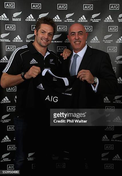 All Black captain Richie McCaw with CEO, AIG Property Casualty, APAC Jose Hernandez before a NZRU and AIG sponsorship announcement at Viaduct Events...