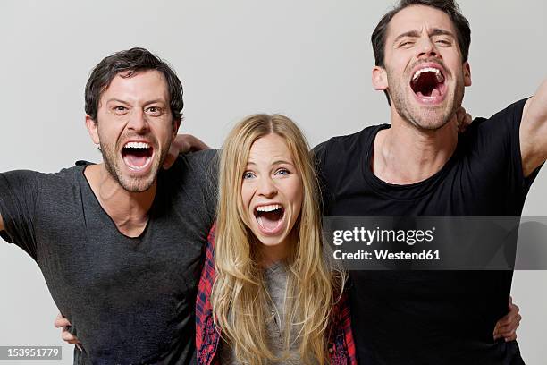 men and woman shouting, portrait - small group of people white background stock pictures, royalty-free photos & images