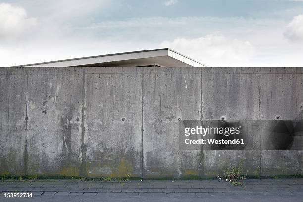 germany, building behind wall - concrete sidewalk stock pictures, royalty-free photos & images