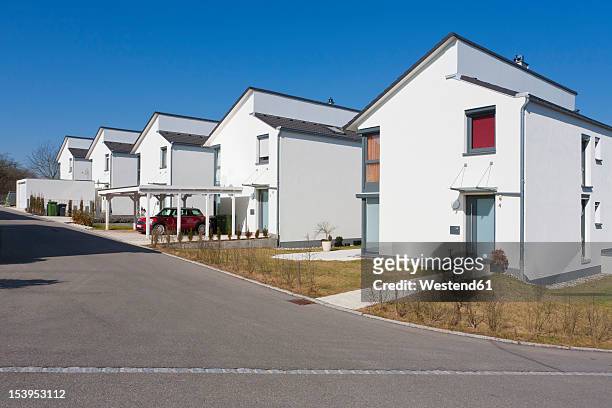 germany, baden wurttemberg, aldingen, row of modern detached houses - terraced house stock pictures, royalty-free photos & images