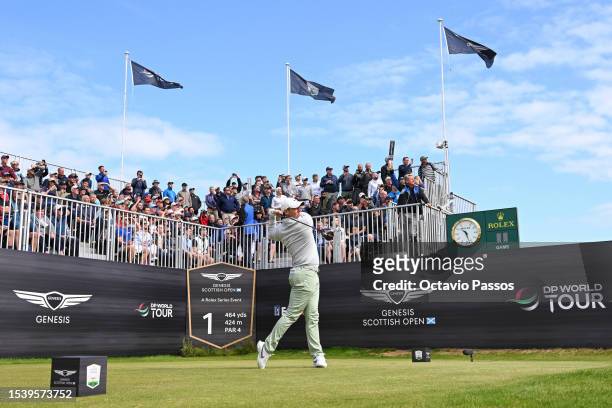 Rory McIlroy of Northern Ireland tees off on the 1st hole during Day One of the Genesis Scottish Open at The Renaissance Club on July 13, 2023 in...