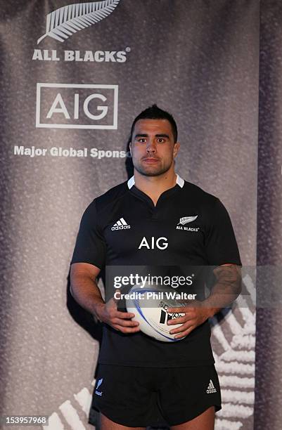 Liam Messam of the All Blacks models the new jersey on stage during a NZRU and AIG sponsorship announcement at Viaduct Events Centre on October 12,...