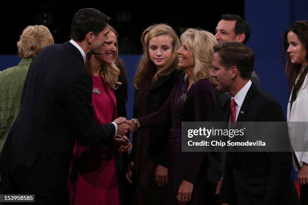 Republican vice presidential candidate U.S. Rep. Paul Ryan and wife Janna Ryan greet Dr. Jill Biden, wife of Joe Biden after the vice presidential...