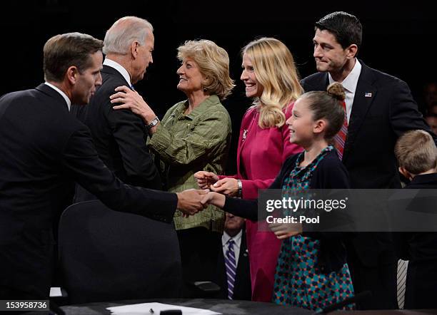 Vice President Joe Biden greets Republican vice presidential candidate U.S. Rep. Paul Ryan's mother Betty Douglas as Ryan's wife Janna Ryan and...