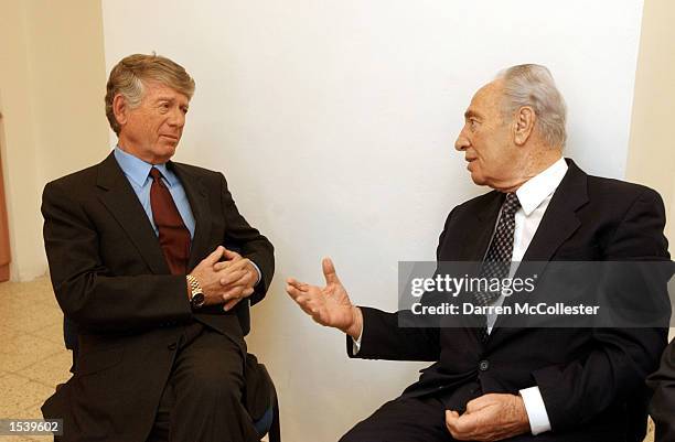 News anchor Ted Koppel listens to Israeli Foreign Minister Shimon Peres May 3, 2002 prior to a taping of "Nightline's Town Meeting" at the Church of...