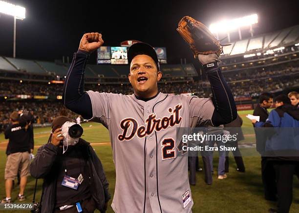 Miguel Cabrera of the Detroit Tigers celebrates as he walks off the field after the Detroit Tigers beat the Oakland Athletics in Game Five of the...