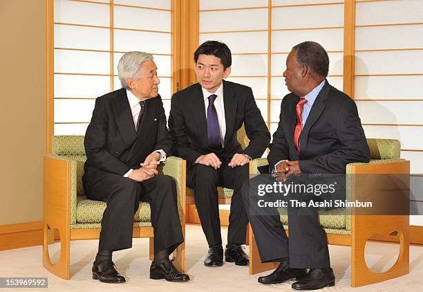 Emperor Akihito and Zambian President Michael Chilufya Sata speak during their meeting at the Imperial Palace on October 11, 2012 in Tokyo, Japan....