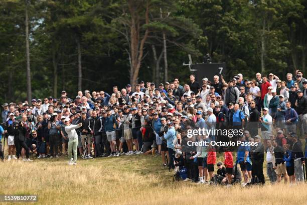 Rory McIlroy of Northern Ireland plays his second shot on the 8th hole during Day One of the Genesis Scottish Open at The Renaissance Club on July...