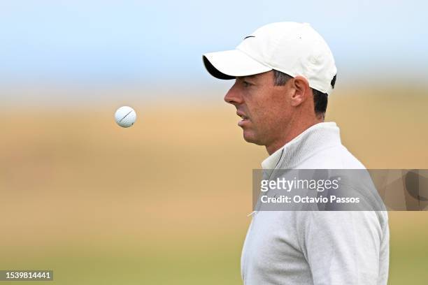 Rory McIlroy of Northern Ireland throws his ball up as he walks off the 8th green during Day One of the Genesis Scottish Open at The Renaissance Club...