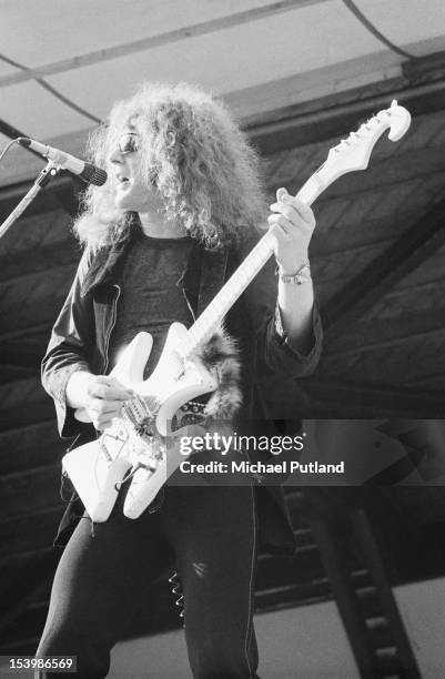 Singer and guitarist Ian Hunter of Mott the Hoople in concert during Rock At The Oval in London, 18th September 1971. He is playing his distinctive...