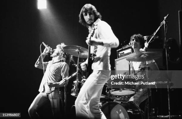 English rock band The Who in concert at the Rainbow Theatre, London, November 1971. From left to right, singer Roger Daltrey, guitarist Pete...