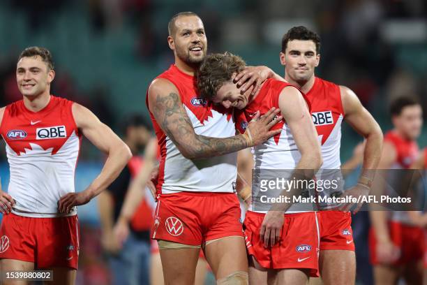 Lance Franklin of the Swans and Nick Blakey of the Swans celebrate victory during the round 18 AFL match between Sydney Swans and Western Bulldogs at...