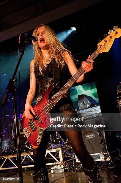 Ida Evileyet, bass guitarist with Swedish rock band Crucified Barbara, performing live on stage at the Skegness Rock and Blues Festival, January 29,...