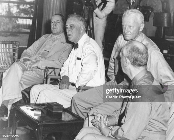 American politician and US President Franklin D. Roosevelt meets with military leaders, Pearl Harbor, Hawaii, July 26, 1944. Discussing the drive to...