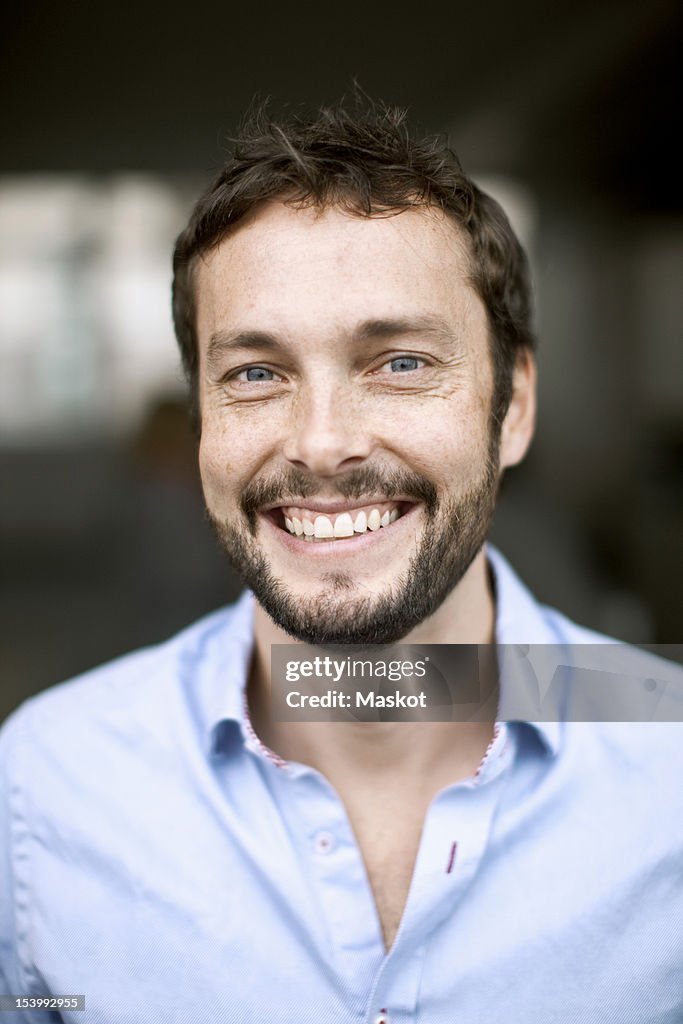 Portrait of businessman smiling