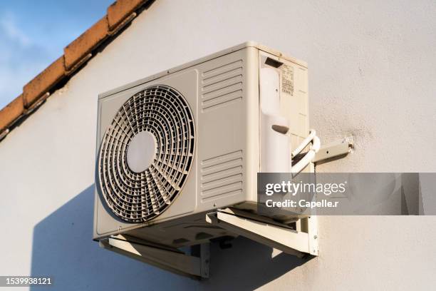 heat pump at home - heat pump stock pictures, royalty-free photos & images