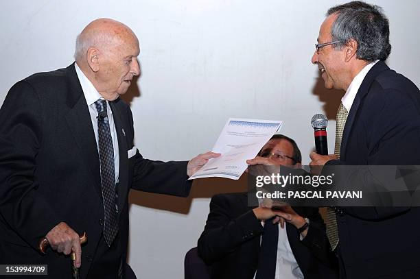 Sylvio Ferrera, a French-american aged 96 receives his engineer degree from Alain Ayache, director of the Enseeiht, one of France's most prestigious...