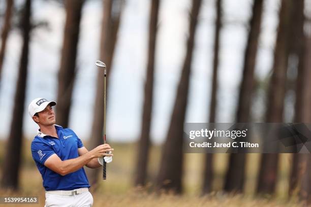 Viktor Hovland of Norway looks on after playing his 2nd shot on the 1st hole during Day One of the Genesis Scottish Open at The Renaissance Club on...