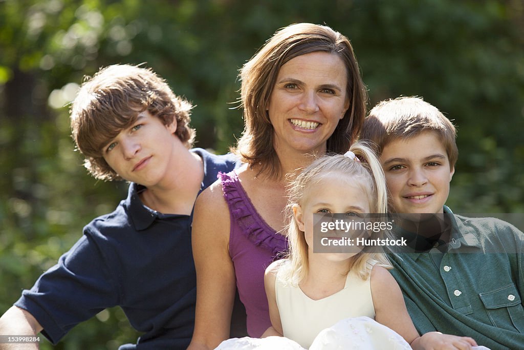 Portrait of a happy mother with her children