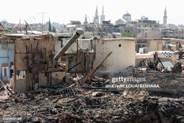 General view shows the remains of the damage around the historic Beit Youssef, one of four buildings damaged by a fire that broke out on the weekend,...