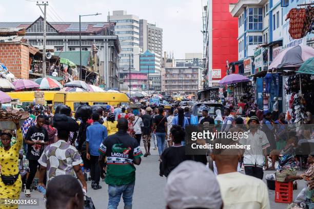Shoppers and traders in a congested street market in Lagos, Nigeria, on Monday, July 17, 2023. Nigeria's monthly inflation rate soared to a...