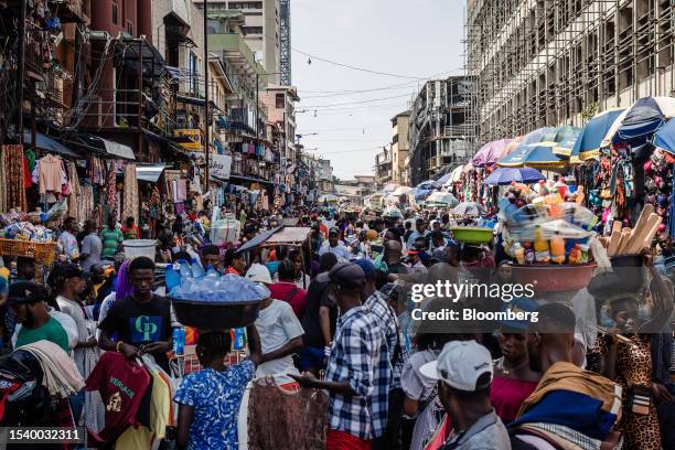 Shoppers and traders in a congested street market in Lagos, Nigeria, on Monday, July 17, 2023. Nigeria's monthly inflation rate soared to a...