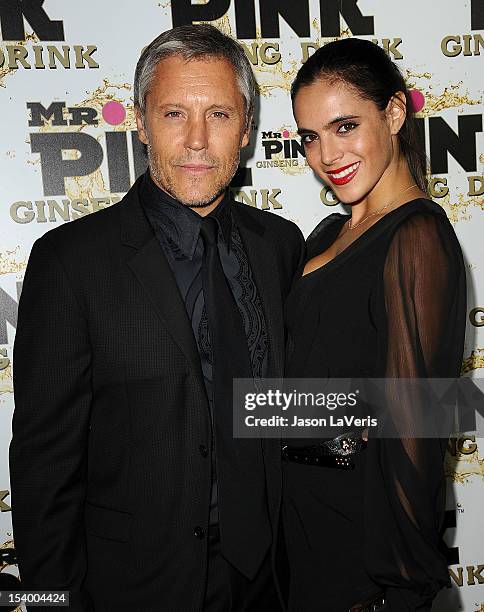 Actor Max Ryan and guest attend the Mr. Pink Ginseng Drink launch party at Regent Beverly Wilshire Hotel on October 11, 2012 in Beverly Hills,...