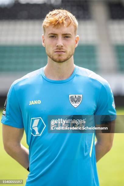 Roman Schabbing of of SC Preußen Münster poses during the team presentation at on July 13, 2023 in Muenster, Germany.