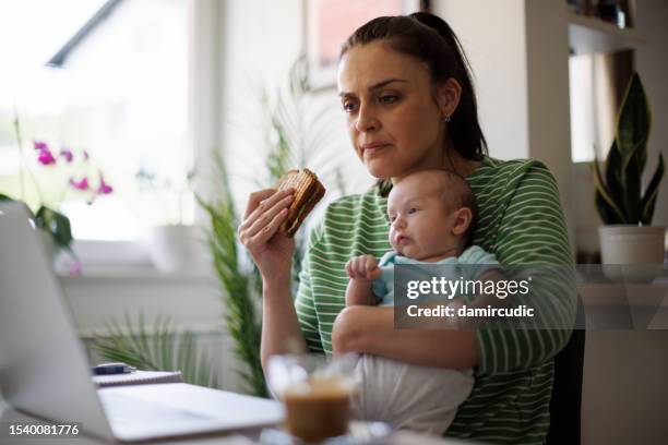 mother working at home office - stress eating stock pictures, royalty-free photos & images