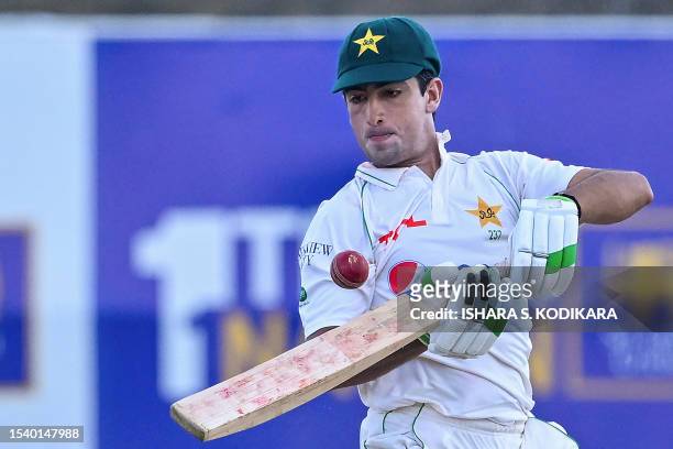 Pakistan's Naseem Shah plays a shot during the third day of the first cricket Test match between Sri Lanka and Pakistan at the Galle International...