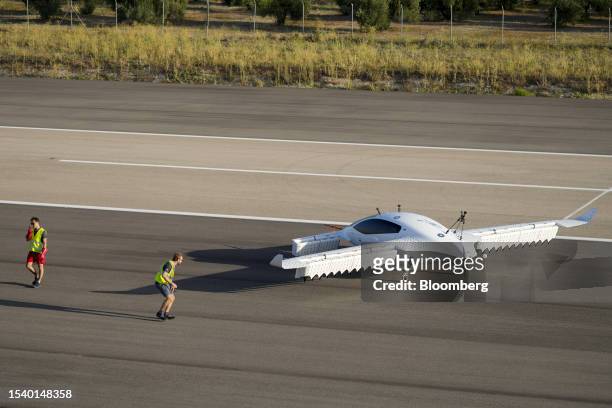 Ground crew prepare a Lilium NV electric vertical take-off and landing aircraft for a test flight at the ATLAS Flight Center, near Villacarillo,...