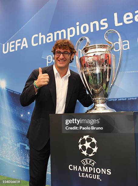 Ciro Ferrara poses with the UEFA Champions League Trophy during the UEFA Champions League Trophy Tour 2012/13 on October 12, 2012 in Naples, Italy.