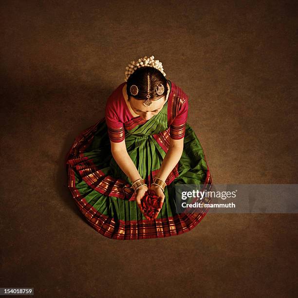 rose petal offering to the gods - traditional ceremony stock pictures, royalty-free photos & images