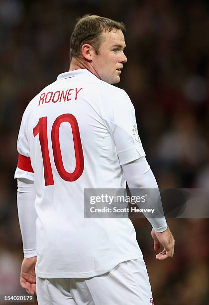 Wayne Rooney captain of England looks on during the FIFA 2014 World Cup Group H qualifying match between England and San Marino at Wembley Stadium on...