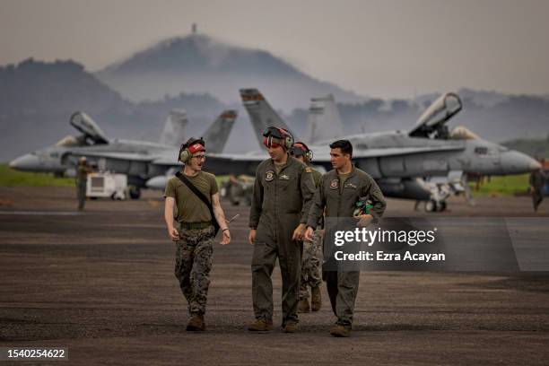 Marines prepare F/A-18 Hornet fighter jets as they take part in the bi-annual Marine Aviation Support Activity 23 at the airport of a former US naval...