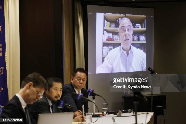 Former Nissan Motor Co. Chairman Carlos Ghosn , who fled Japan in December 2019 while awaiting trial, attends a press conference online, held at the...