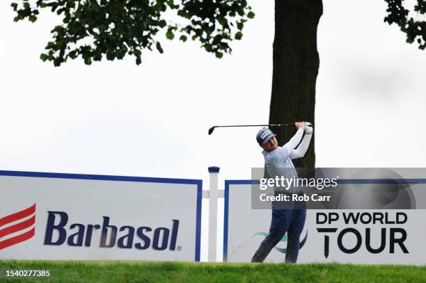 Austin Cook of the United States plays his shot from the 12th tee during the first round of the Barbasol Championship at Keene Trace Golf Club on...