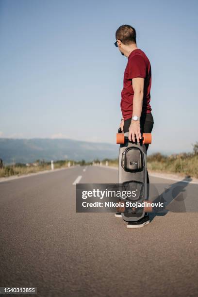 near the highway is meadow from where you can watch beautiful sunset - she can skate stock pictures, royalty-free photos & images