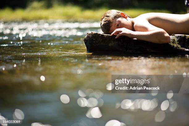 Bot Sunbaking 2,557 Boy Sunbathing Stock Photos, High-Res Pictures, and Images ...