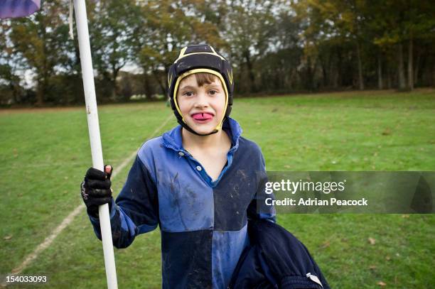 boy with gum shield playing rugby - gum shield stock pictures, royalty-free photos & images