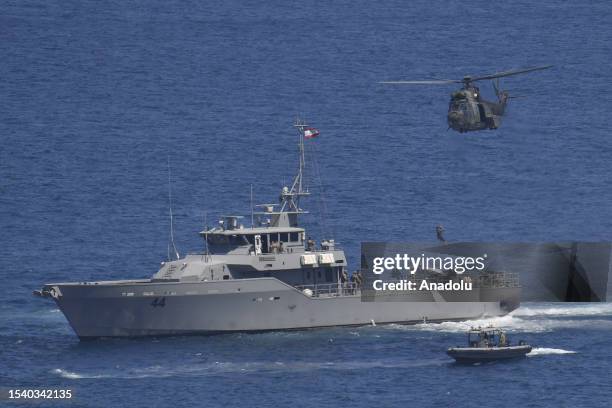 Helicopter flies over a Lebanese military ship during the multinational naval exercise "Resolute Union 2023" with the participations of the US, UK,...