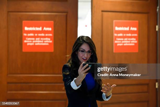 Rep. Lauren Boebert films a video of herself before attending a briefing by U.S. Secret Service officials on the cocaine substance found at the White...