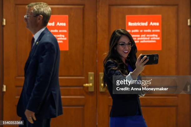 Rep. Lauren Boebert films a video of herself before attending a briefing by U.S. Secret Service officials on the cocaine substance found at the White...