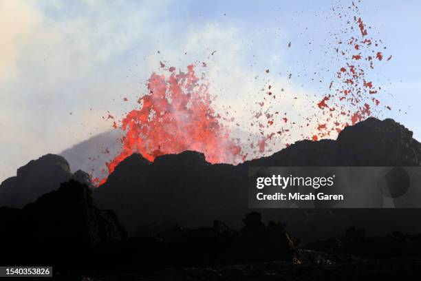 Visitors come to see the volcanic activity near Iceland's main airport on the second day of the eruption on July 11, 2023 in in Litli Hrútur near...