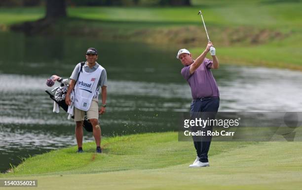 Henry of the United States plays a second shot on the 18th hole during the first round of the Barbasol Championship at Keene Trace Golf Club on July...