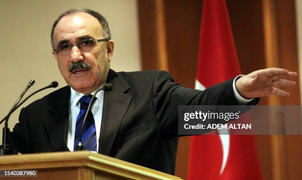 Turkey's Interior Minister Besir Atalay speaks during a press conference about his government's Kurdish policy in Ankara on October 23, 2009....