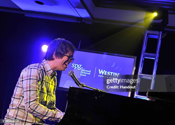 In this handout from Starwood Preferred Guest, musician Ben Folds of Ben Folds Five performs during the exclusive Ben Folds Five performance hosted...